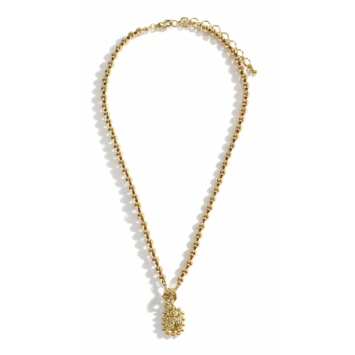 Sparkling Droplets in Gold